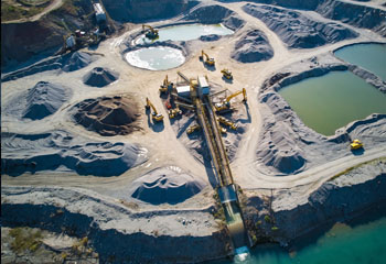 Complete operational capability including placer mining equipment, geological surveys, defence and government project consultancy